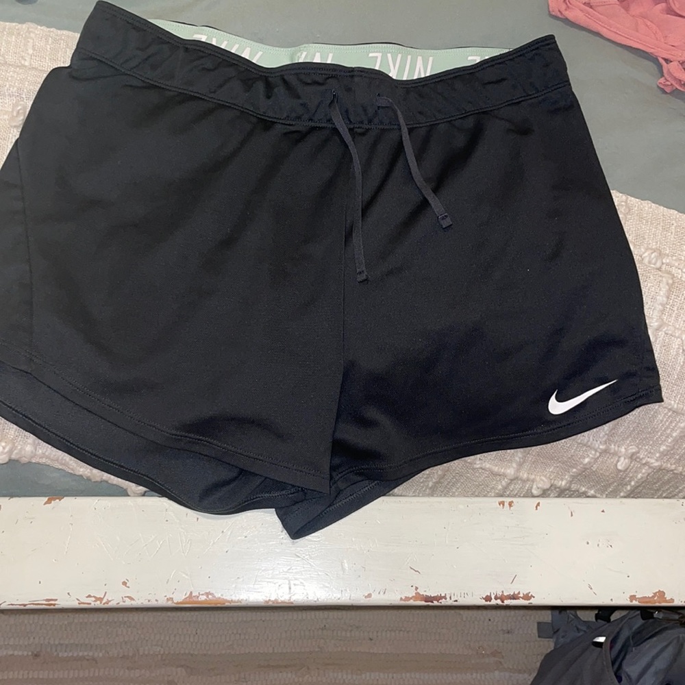 Women’s Nike shorts size small. Charcoal grey
